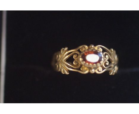 9ct Gold ring set with red stone Size K 