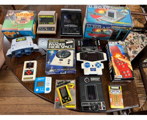 A collection of handheld games including Bandai 'U Boat', Palitoy 'Merlin', Grandstand Invader from Space, Alex Higgins 'Cue 