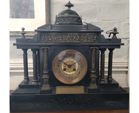 A Belgium slate mantel clock. Circa 1901 of architectural form 