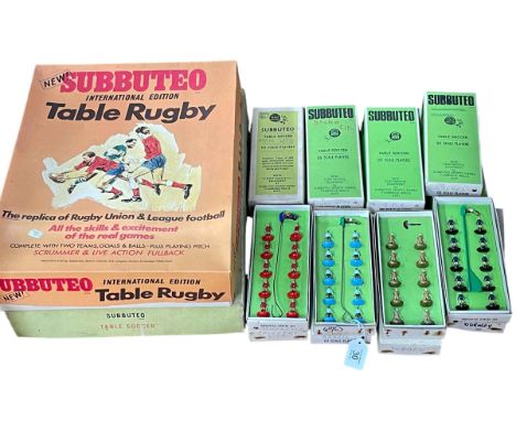 Subbuteo table soccer and rugby and sixteen boxes of teams.
