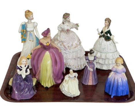 Collection of eight figures including Royal Worcester The Fairest Rose and Debutante, three Doulton, two Goebel, etc.