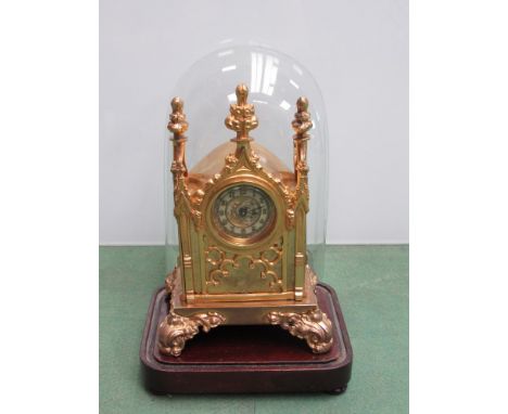 A Gothic gilt brass mantel clock under a dome, 22cm tall 
