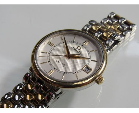 OMEGA: a De Ville steel and gold plated quartz gent's bracelet watch, engine turned silvered dial with centre seconds and dat