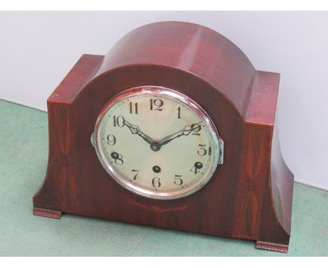 A 1930's mahogany and inlaid cased mantel clock, silvered Arabic dial with three train striking and chiming movement, key and