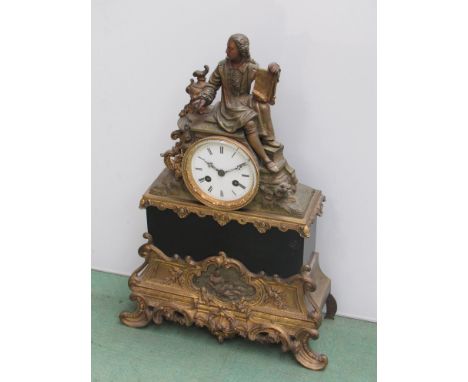 A 19th Century French gilt figural mantel clock depicting a seated scholar, Roman enamelled dial with 8 day striking movement