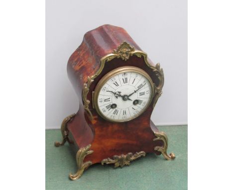 A 19th Century French walnut veneered and Ormulu mantel clock, Roman porcelain dial (a/f) indistinctly signed J.W Benson, 8-d