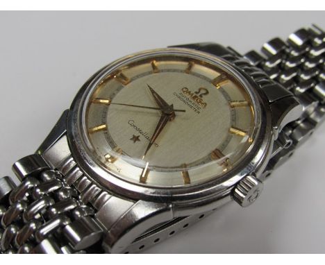 OMEGA: A Constellation automatic chronometer steel cased gent's bracelet watch, silvered two tone dial with centre seconds, o