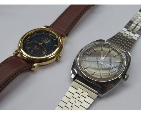 A Raymond Weil quartz moonpahse wristwatch and a Timex steel cased quartz wristwatch