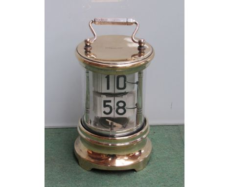 A Ticket/Plato clock, circa 1905 in brass and silver plate by Ever-Ready under licence from Jonghans, with integral key