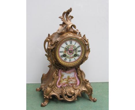 A 19th Century French gilt Japy Freres mantel clock with Sevres porcelain panels, 33cm high