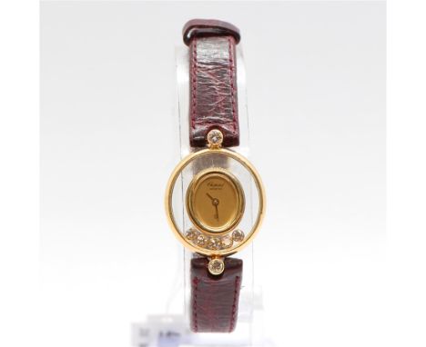 Damenarmbanduhr18 kt Gelbgold, Chopard Happy Diamonds, mit 5 beweglichen Brillanten und 2 Brillanten am Gehäuse, goldfarbenes