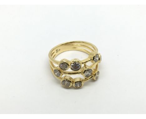 A 9ct gold scaffold style ring set with scattered RBC diamonds. Diamonds approx 1.73ct, approx 4.2g and approx size O.