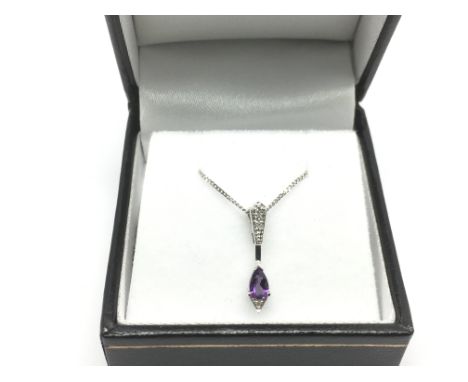 A boxed 9ct white gold Art Deco style amethyst and diamond necklace. Pear shaped amethyst approx 0.24ct, diamonds approx 0.02