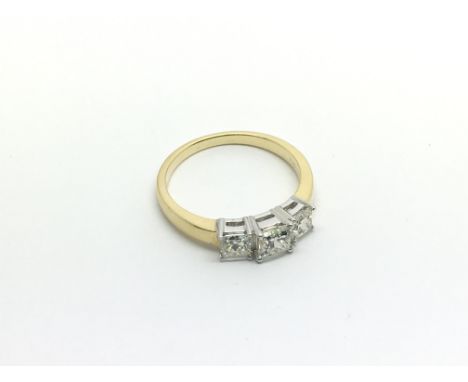 An 18ct yellow and white gold three stone princess cut diamond trilogy ring. Diamonds approx 1ct, approx 3.7g and approx size