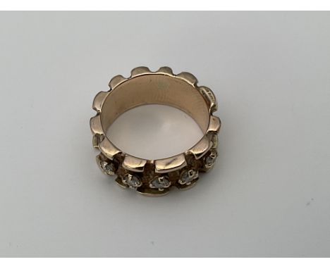 A 9ct yellow gold ring set with 5 diamonds, 4.8g, K.