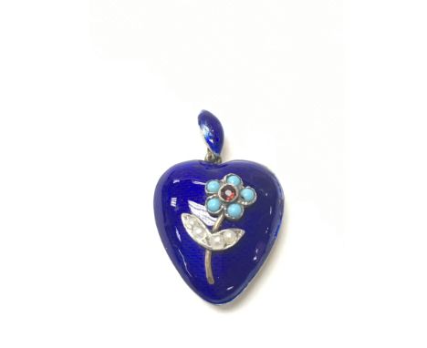 A gold and enamel heart pendant with a flower decoration.