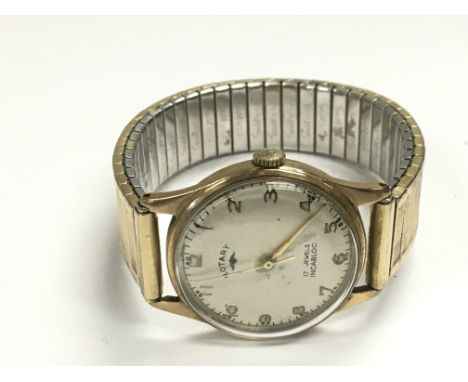 A gents 9ct gold Rotary watch with Arabic numerals.