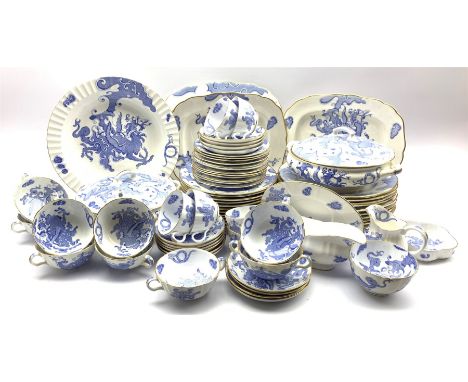 Royal Worcester Blue Dragon pattern dinner service comprising twelve dinner plates, twelve starter plates, twelve dessert pla