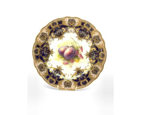 Royal Worcester hand painted cabinet plate by Albert Shuck c1925, centrally decorated with plums and raspberries against a co