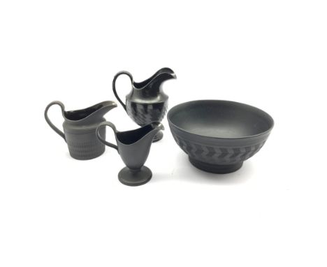Wedgwood black basalt bowl and three jugs with engine turned decoration, H13cm max (4) - Condition Report 