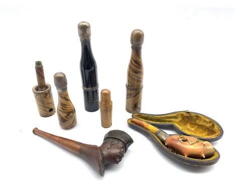 Novelty pipe in the form of a champagne bottle inscribed 'Franco-British Exhibition London 1908' H15cm, two others, unmarked,