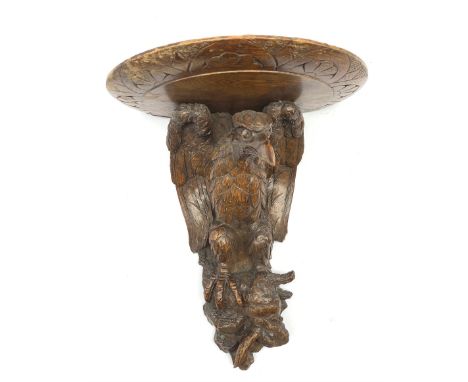 Late 19th century Black Forest wall bracket carved with an eagle and rabbit 32cm x 25cm - Condition Report 