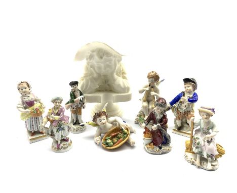 Collection of German and Continental porcelain figures including a pair of Sitzendorf figures, four other Sitzendorf figures 