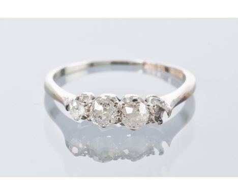 DIAMOND FOUR STONE RING
set with two old brilliant cut diamonds and one modern brilliant cut diamond, one stone missing, mark