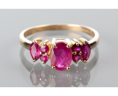 RUBY FIVE STONE DRESS RING
set with oval, round and marquise cut rubies, hallmarked for nine carat gold, size N