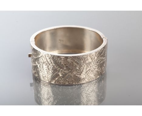 VICTORIAN SILVER BANGLE
with engraved fern motifs, Birmingham marks