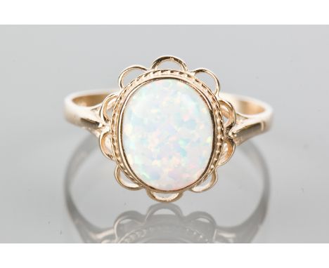 OPAL RING
set with an oval opal, hallmarked for nine carat gold, size N