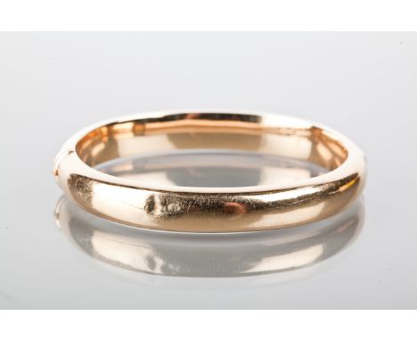 GOLD BANGLE
unmarked but tests as 14-15 carat gold, 21.1g
