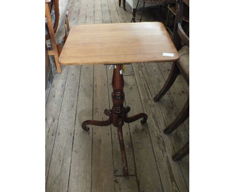 A Victorian rectangular mahogany tripod table