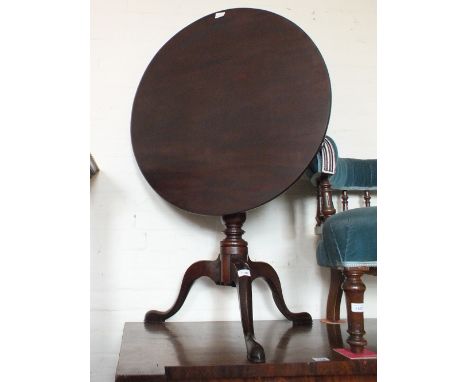 A 19th Century mahogany circular snap top tripod table