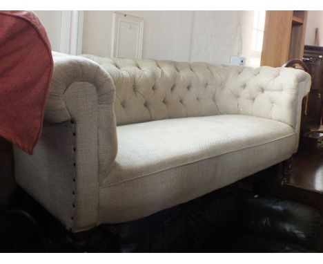 A Victorian button back Chesterfield with brown tweed upholstery