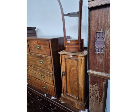 A Victorian mahogany bedside cabinet and a mahogany planter. 