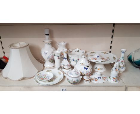 18 items of Aynsley china including a lamp with shade, footed cake stand, a pair of candle holders, lidded pots, vases etc.