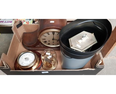 Three clocks and a barometer. 
