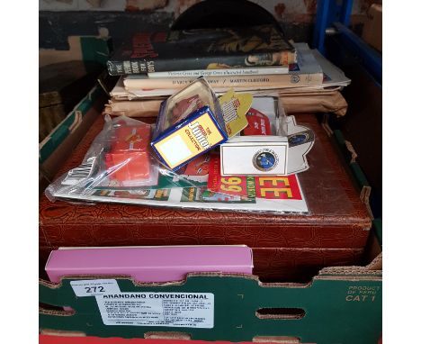 A box containing a clock, 3 Lledo boxed car, briefcase containing books etc