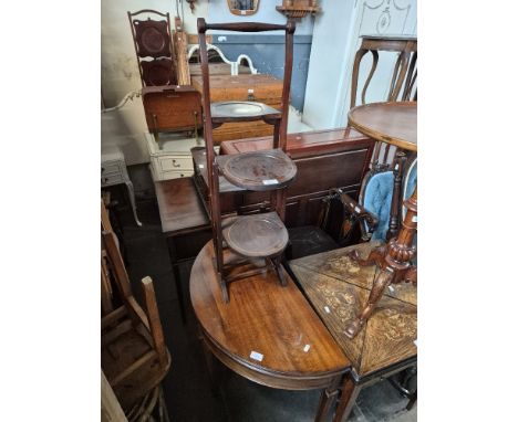 A mahogany demi lune fold top card table and an inlaid mahogany folding cake stand. 