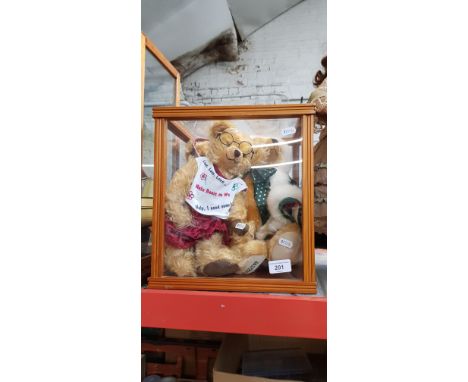 Three limited edition Hermann bears and a Steiff display box. 