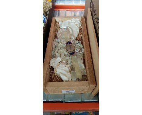 A Swatch 'Chandelier' watch in wooden presentantion case with glass holder. 