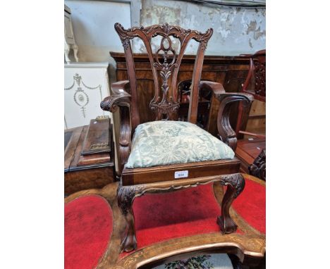 A Chippendale style carved mahogany child's chair. 