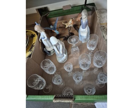 A box of assorted items to include 3 Nao pieces and various drinking glasses to include Dartington etc.