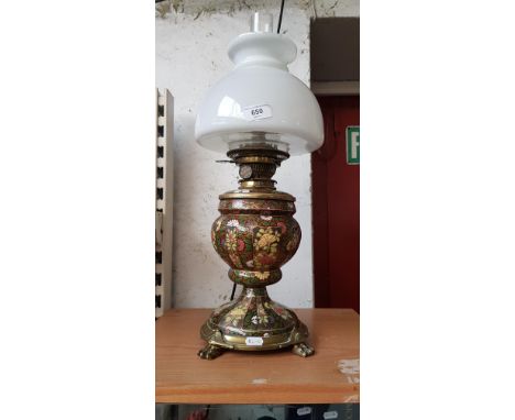 A late 19th century pottery and brass oil lamp converted to electric.Condition:- General wear throughout with some nibbles an