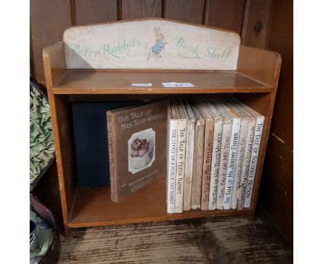 Peter Rabbit Book Shelf with fourteen Beatrix Potter books. 