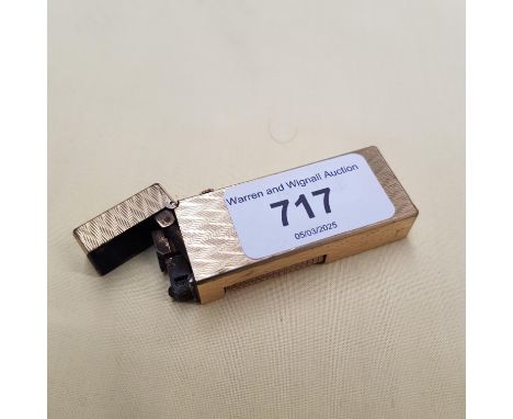A Dunhill gold plated lighter. 