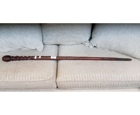 An African carved hardwood knobkerrie club. 