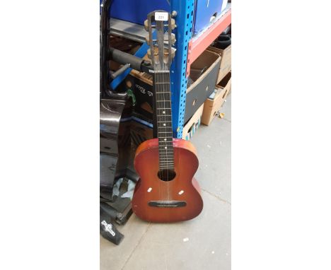 A vintage acoustic guitar 
