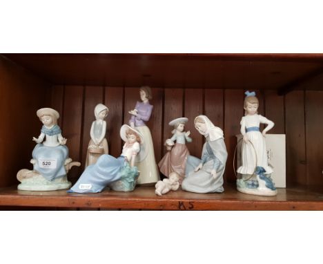 8 Nao porcelain figurines including two from the Nativity Set - Baby Jesus (boxed) and Mary